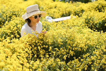 adult, background, beautiful, beauty, caucasian, dress, female, field, flower, freedom, fun, girl, grass, green, happiness, happy, hat, healthy, joy, Landscape, meadow, natural, nature, outdoor, peopl