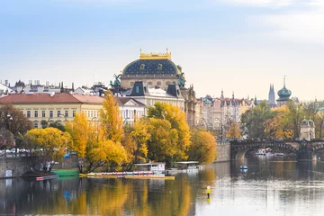 Deurstickers prague river bank and old town at background, czech republic © jon_chica