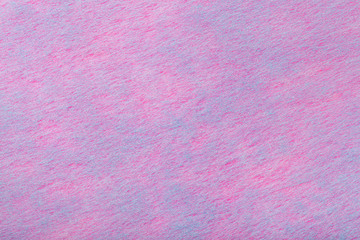 Light purple and blue background of felt fabric. Texture of woolen textile