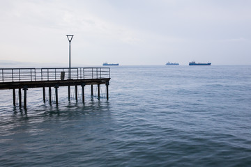 Obraz premium Beach and bridge. Travel photo 2018, december. Landscape and nature.