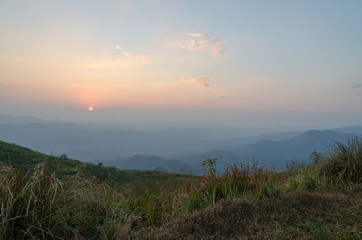 Mountain field during sunset. Beautiful natural landscape, Kanchanaburi, Thailand