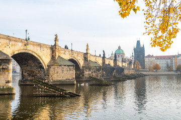 prague river bank and old town at background, czech republic