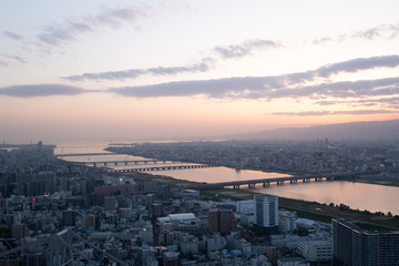 Fototapeta premium Aerial view of Osaka at sunset, Japan