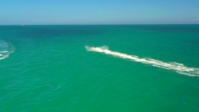 Aerial chase fast jet ski waverunner Miami