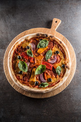 Pizza diavolo traditional italian meal from spicy salami peperoni chili onion olives and basil