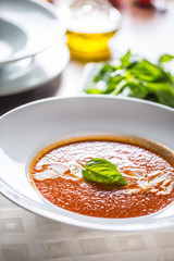 Tomato soup traditional mediterranean meal with parmesan and basil