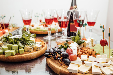 Tasting cheese dish . Delicious cheese on the table. Table setti