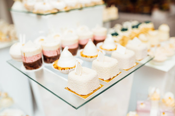 Table with different sweets for party. Candy bar. 