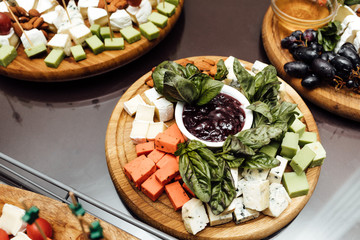 Tasting cheese dish . Delicious cheese on the table. Table setti