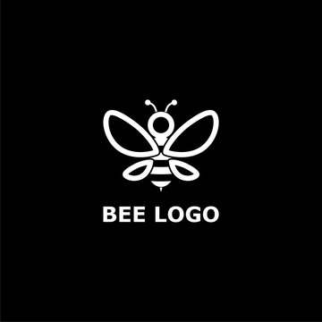 Bee logo for bee or honey business icon on dark background