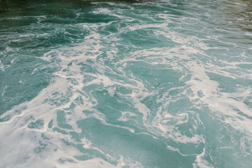 Background shot of aqua sea water surface