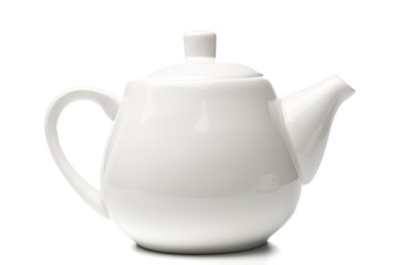 White teapot on white background