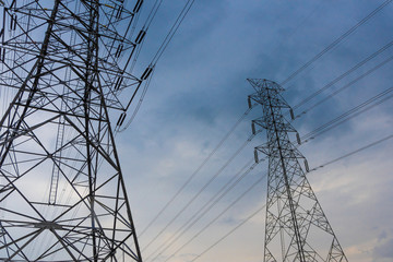 Electricity concept. Close up high voltage power lines station.