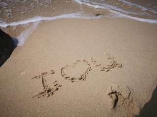I Love You written on the beach