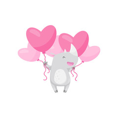 Cheerful little rhino with bunch of pink heart-shaped balloons. Funny wild animal. Flat vector design © Happypictures