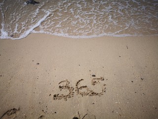 365 days written on the beach