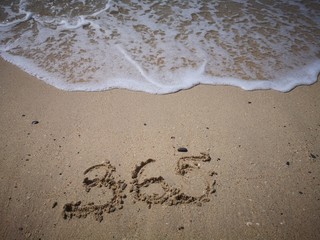 365 days written on the beach