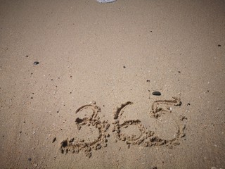365 days written on the beach