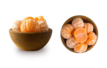 Clementines slices isolated on white background. Fresh tangerines with copy space for text. Slices of mandarin with leaves isolated on white background. Tangerines isolated on white background.