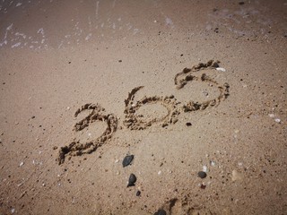 365 days written on the beach