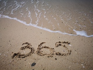 365 days written on the beach