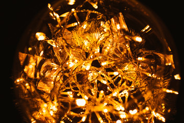 Christmas luminous garland on a dark background