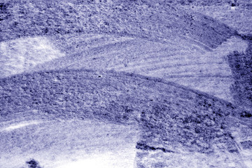 Snow surface on car glass in blue tone.