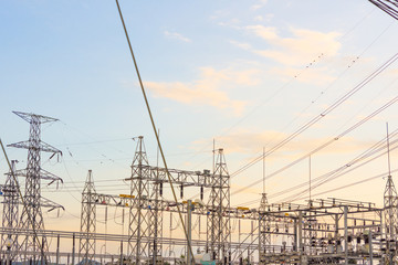 Electricity concept. Close up high voltage power lines station.