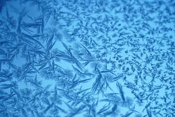 frost crystal on window glass in winter season