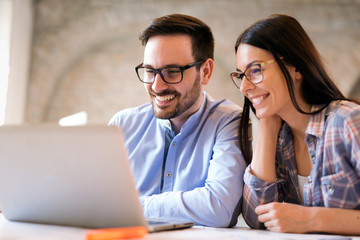 Picture of young architects discussing in office