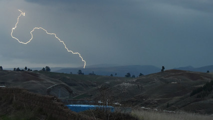 A lightening bolt during a storm in the Andes mountains, Ayacucho, Peru