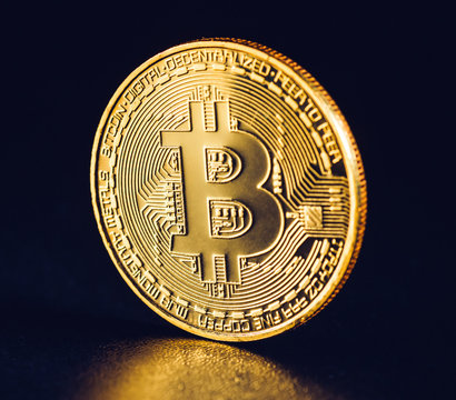 Bitcoin. Crypto currency Gold Bitcoin, BTC, Bit Coin. Macro shot of Bitcoin coins isolated on black background Blockchain technology,