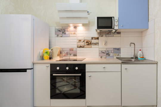 The Interior Of A Compact Kitchen In The Apartment House