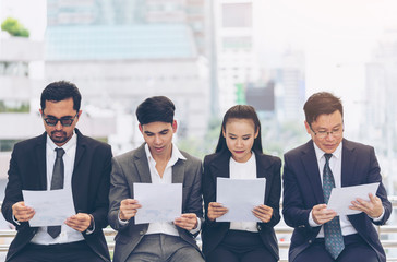 Stressful Asian Business people waiting for job interview.  Concept of People Human Resources Interview Recruitment Job