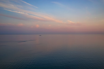 Amazing sunset over the sea and coastline.