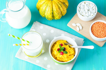 Delicious homemade pumpkin porridge with cranberry and mint
