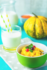 Delicious homemade pumpkin porridge with cranberry and mint