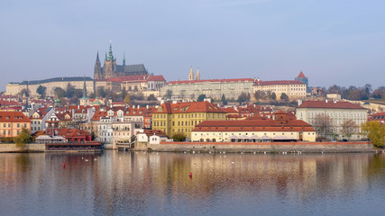 Naklejka na ściany i meble Prague Castle view from old town side in misty autumn season, Czech Republic