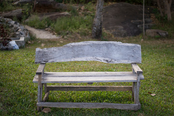 Old wooden bench, In the midst of nature.