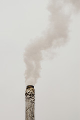Smoke from the chimney against the sky