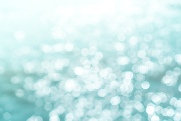 Blur beach with bokeh blue color background.