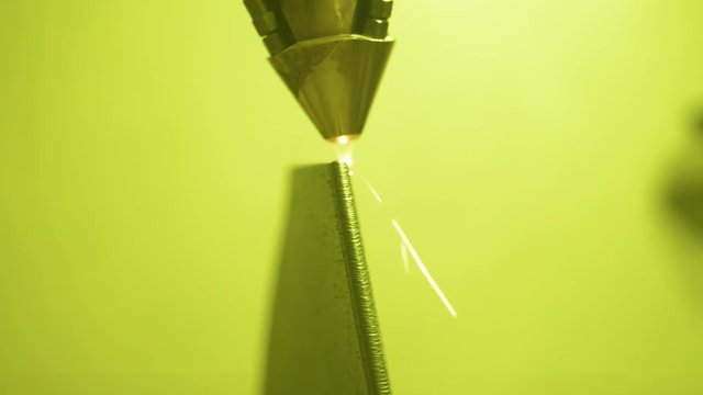 3D metal printer produces a steel part.