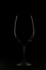 Glass silhouette on black background.