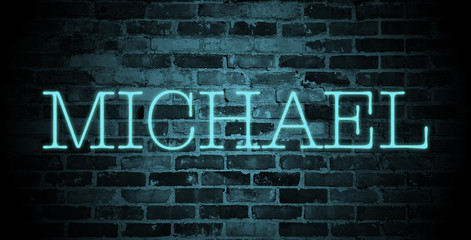 Fototapeta premium first name Michael in blue neon on brick wall
