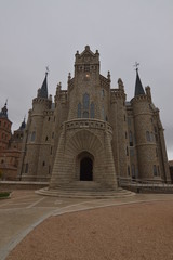 Fototapeta na wymiar Main Facade Of The Episcopal Palace Of Gaudi In Astorga. Architecture, History, Camino De Santiago, Travel, Street Photography. November 1, 2018. Astorga, Leon, Castilla-Leon, Spain.