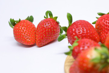 red strawberry ripe sweet fruit on white background
