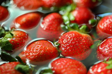 strawberry red fruit cleaning water