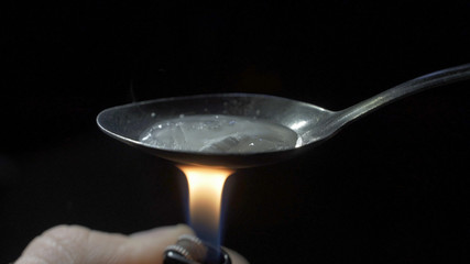 Syringes, drugs, heroin, and cooked