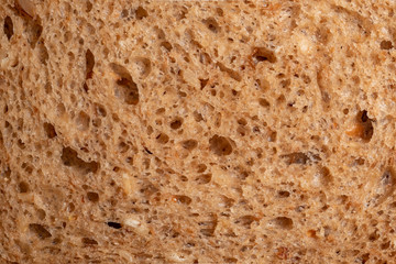 Black bread macro shot, natural background macro