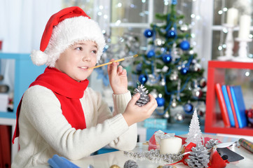 Teen boy preparing for Christmas at home